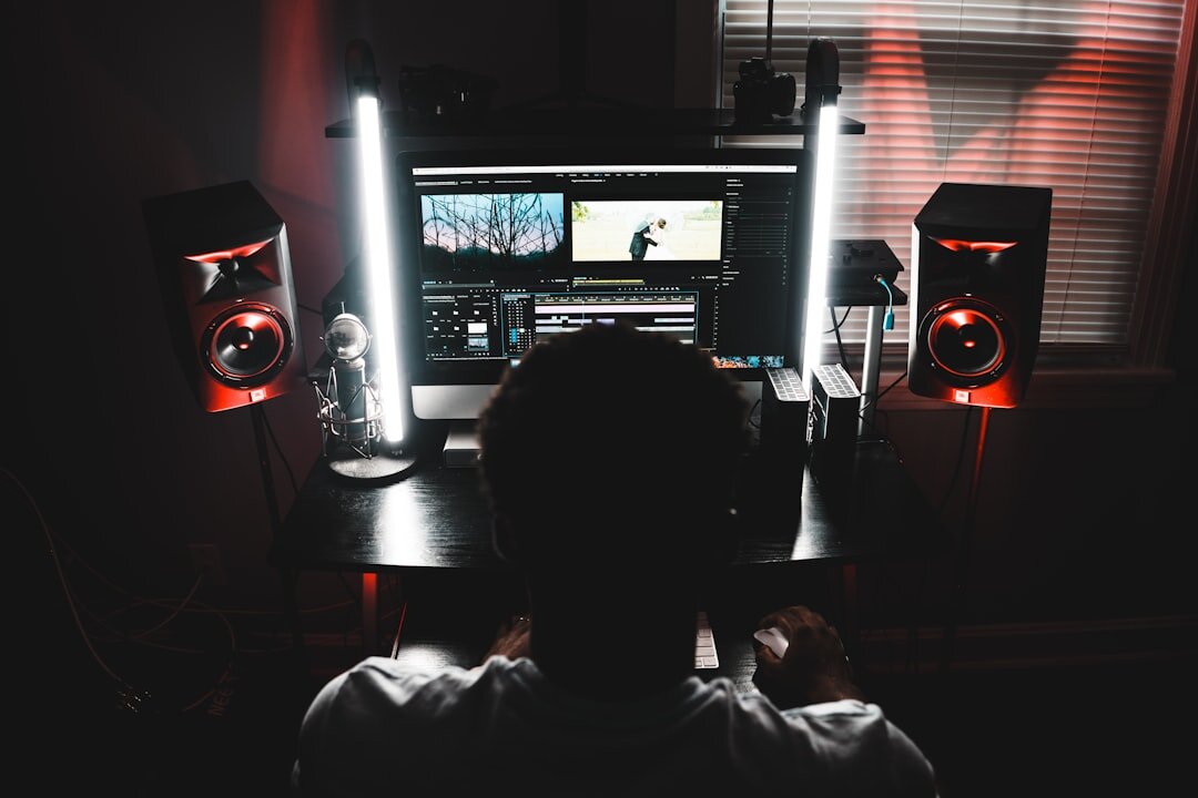 filmmaker editing video on computer